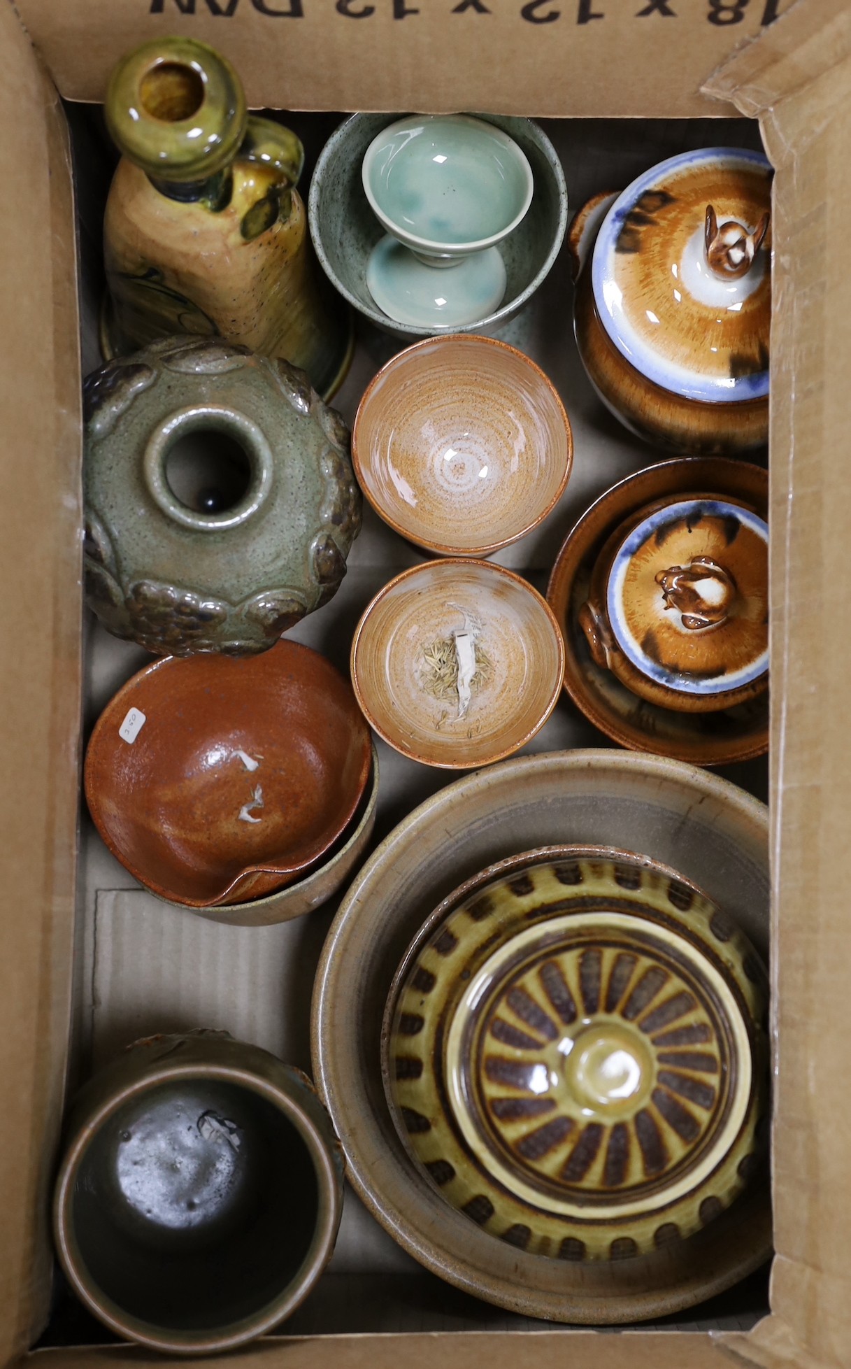 A large quantity of mixed studio pottery bowls, vases, etc.